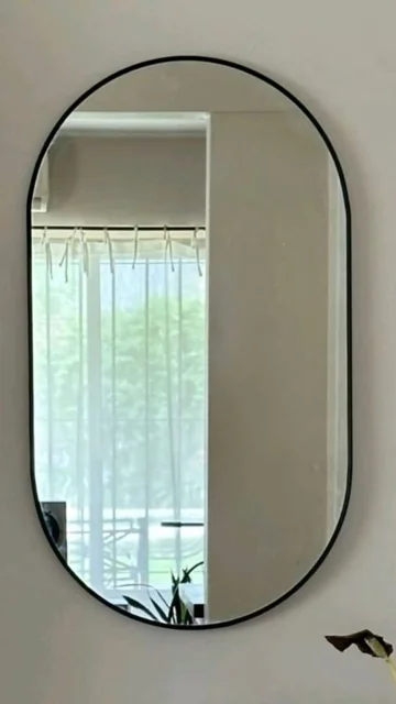 Black Frame Pill-Shaped Wall Mirror