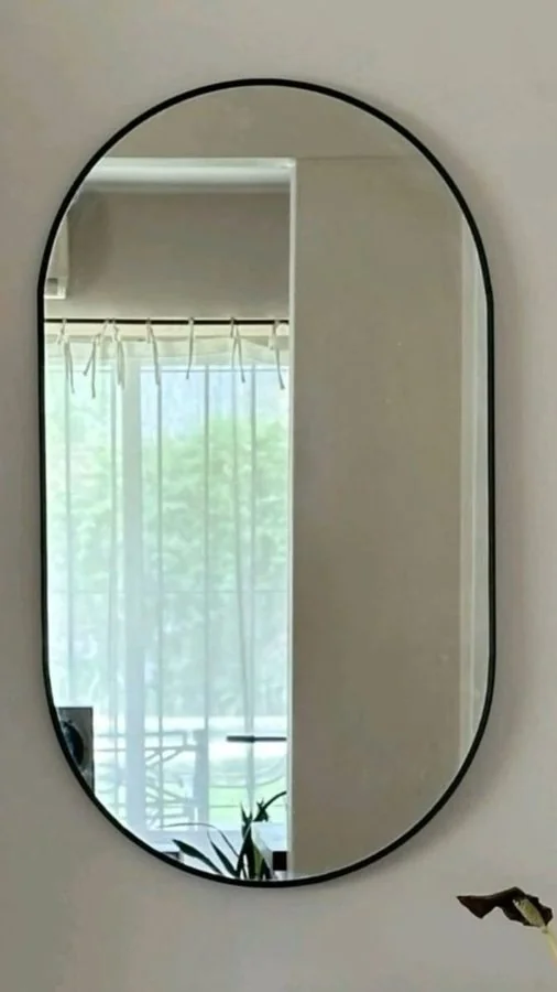 Black Frame Pill-Shaped Wall Mirror